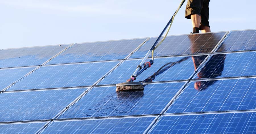 Professional cleaning of rooftop solar panels
